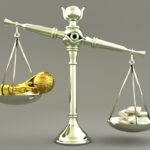 class action lawsuit scales of justice