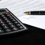 couple signing legal document
