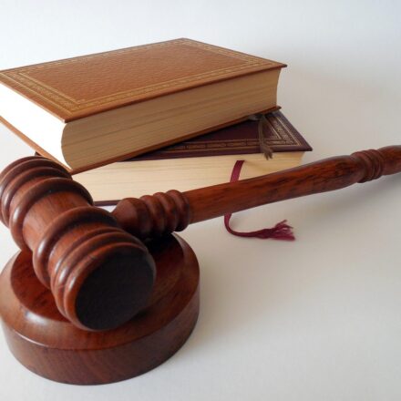court gavel striking block