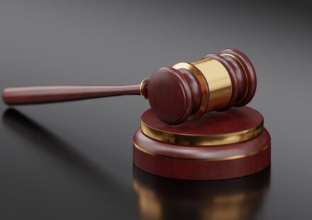 court gavel striking block