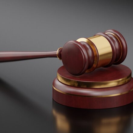 court gavel striking block