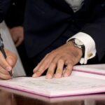 person signing legal document