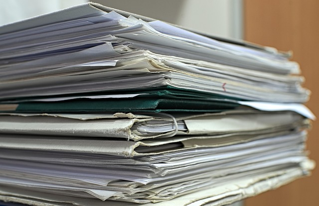 Stack of business documents and files