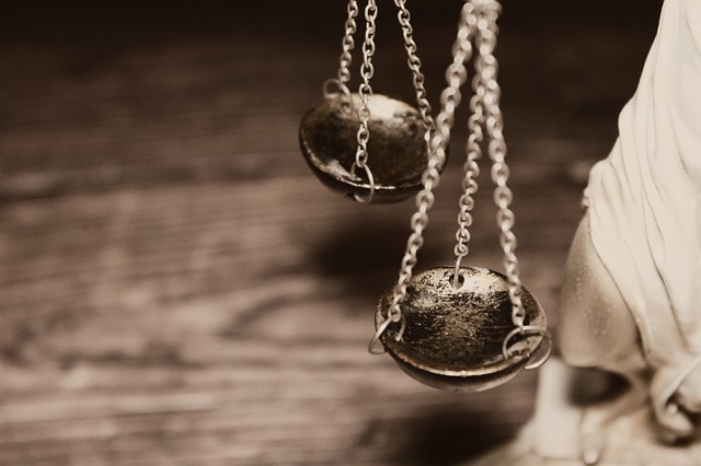 Symbolic image of legal scales with a gavel, representing a legal settlement. (blake lively nude)