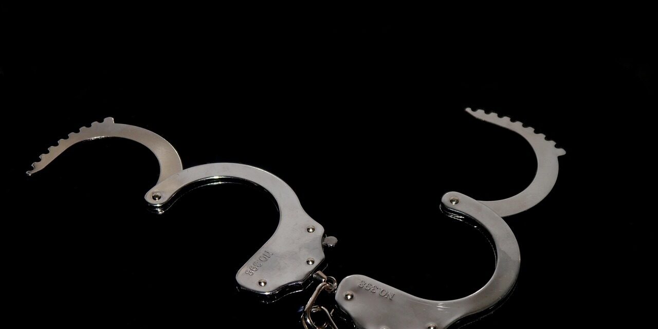 IRS agent handcuffs